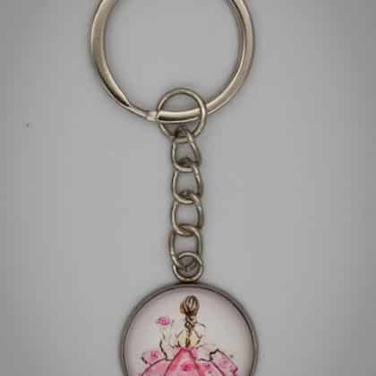 Lány rózsával kulcstartó